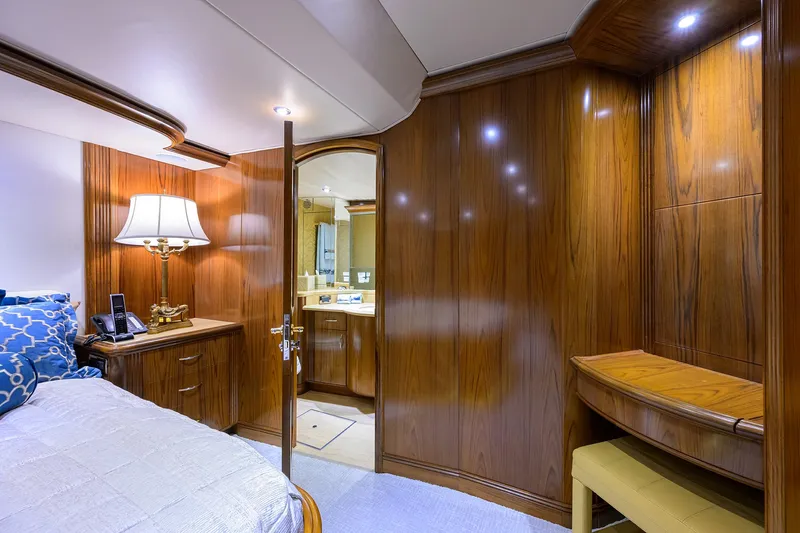 Jr Yacht Photos Pics Luxurious cabin interior of 2004 Sea Force IX 82 Enclosed Bridge yacht with wooden paneling.
