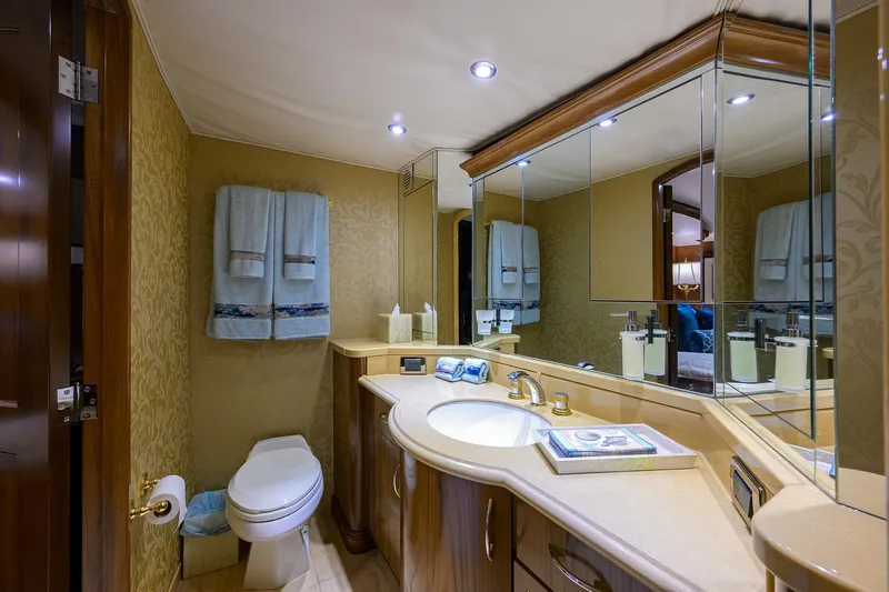 Jr Yacht Photos Pics Luxurious bathroom in 2004 Sea Force IX 82 Enclosed Bridge yacht, featuring elegant fixtures and mirrors.