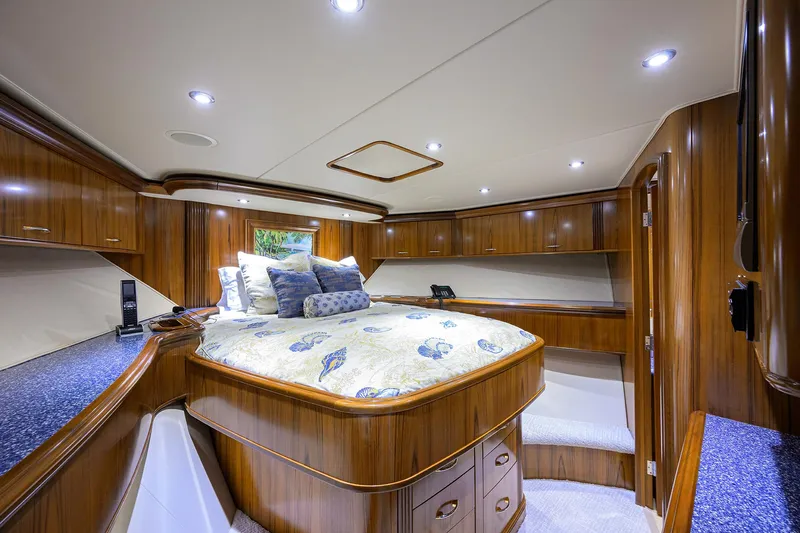 Jr Yacht Photos Pics Luxurious cabin interior of 2004 Sea Force IX 82 Enclosed Bridge yacht, featuring elegant wood finishes.