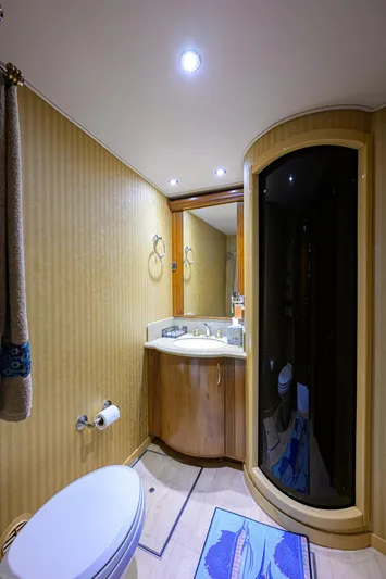 Jr Yacht Photos Pics Luxurious bathroom in 2004 Sea Force IX 82 Enclosed Bridge yacht, featuring modern fixtures and elegant design.