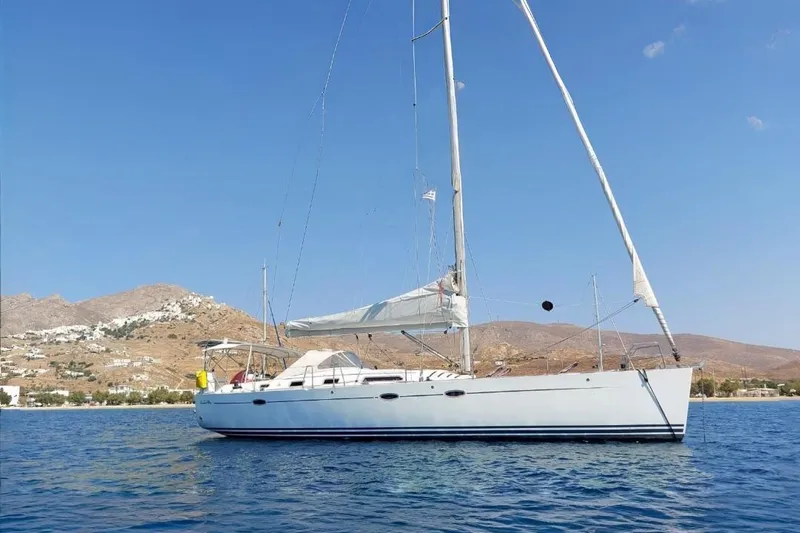  Yacht Photos Pics Sailing yacht Hanse 461, 2006 model, anchored in scenic coastal waters.