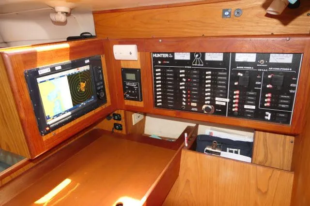 Ale Er Ron Yacht Photos Pics Control panel of a 2000 Hunter 460 sailboat with navigation equipment.