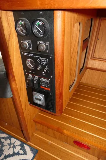 Ale Er Ron Yacht Photos Pics Control panel inside 2000 Hunter 460 yacht with wooden interior.