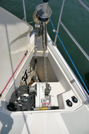 Ale Er Ron Yacht Photos Pics Anchor system on 2000 Hunter 460 sailboat, featuring winch and chain storage.