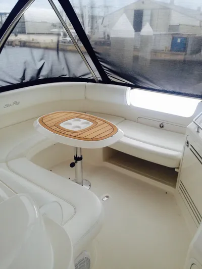 First Light Yacht Photos Pics 2005 Sea Ray 550 Sedan Bridge interior with seating and table.