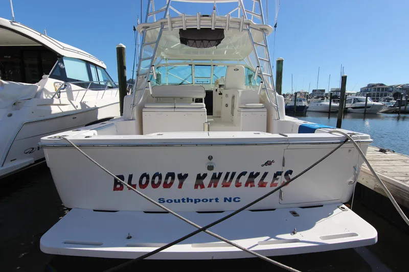 Bloody Knuckles Yacht Photos Pics 2008 Bertram 360 boat named "Bloody Knuckles" docked in Southport, NC marina.