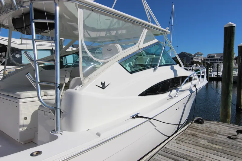 Bloody Knuckles Yacht Photos Pics 2008 Bertram 360 yacht docked at marina, showcasing sleek design and modern features.