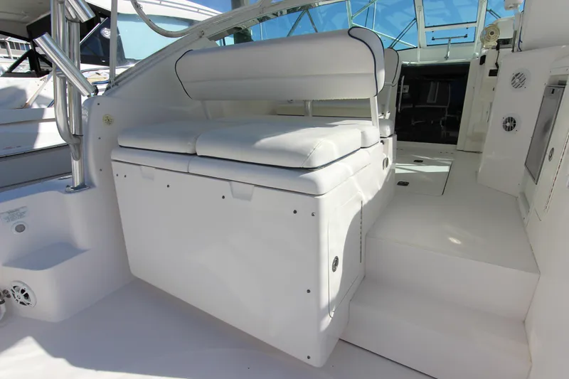 Bloody Knuckles Yacht Photos Pics 2008 Bertram 360 boat interior with white seating and sleek design.