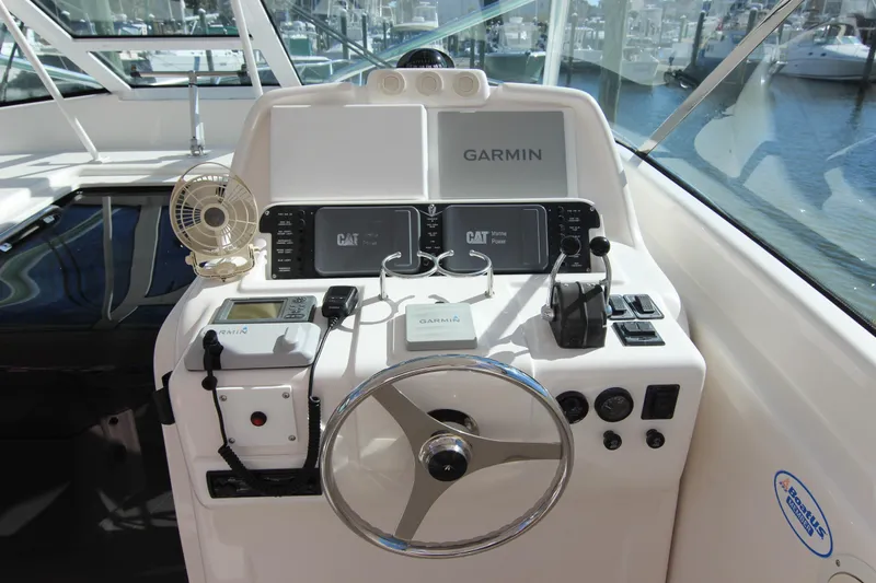 Bloody Knuckles Yacht Photos Pics 2008 Bertram 360 boat helm with Garmin navigation and control systems.