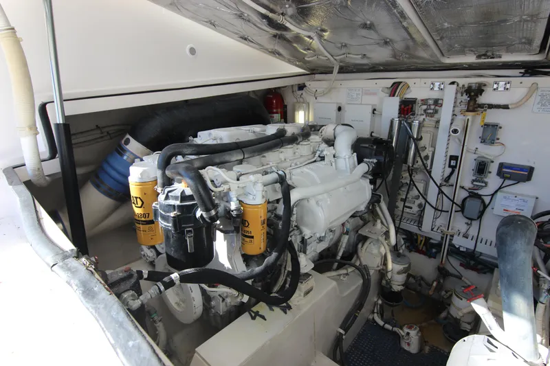 Bloody Knuckles Yacht Photos Pics Engine room of a 2008 Bertram 360 yacht, showcasing detailed machinery and components.