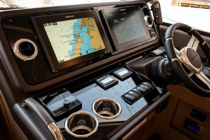 Skylark Yacht Photos Pics Cockpit of 2018 Prestige 460 S yacht with navigation screens and controls.