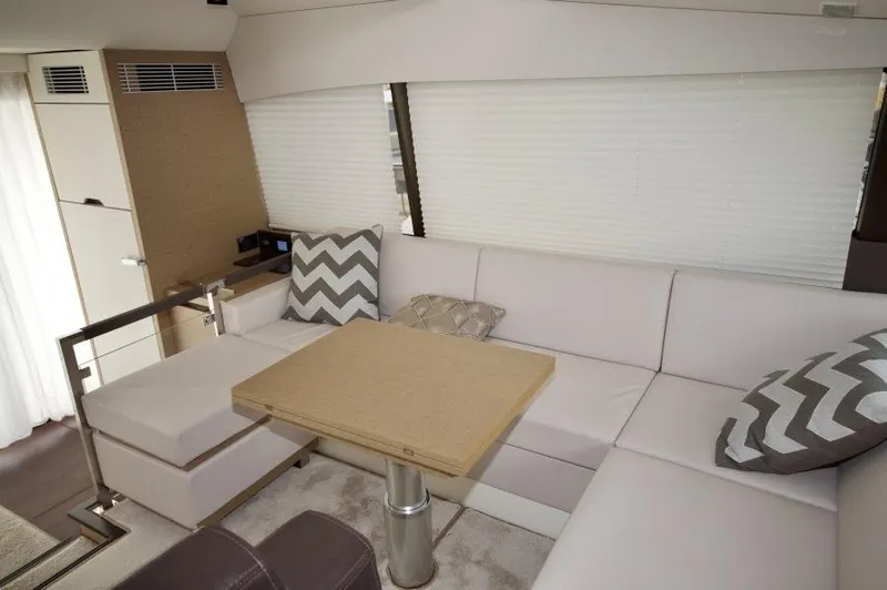 Skylark Yacht Photos Pics Luxurious interior of 2018 Prestige 460 S yacht with modern seating and stylish decor.