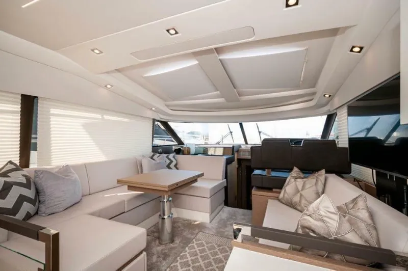 Skylark Yacht Photos Pics Luxurious interior of 2018 Prestige 460 S yacht with modern seating and elegant decor.