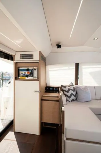 Skylark Yacht Photos Pics Interior of 2018 Prestige 460 S yacht with modern seating and built-in appliances.