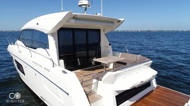 Skylark Yacht Photos Pics 2018 Prestige 460 S yacht on open water, featuring sleek design and spacious deck.