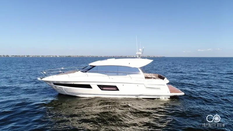 Skylark Yacht Photos Pics 2018 Prestige 460 S yacht cruising on open water under clear blue skies.