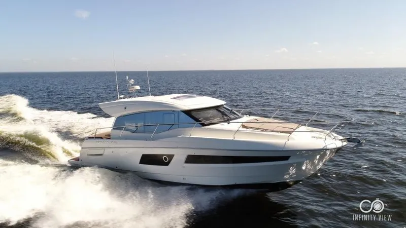 Skylark Yacht Photos Pics 2018 Prestige 460 S yacht cruising on open water, showcasing sleek design and luxury.