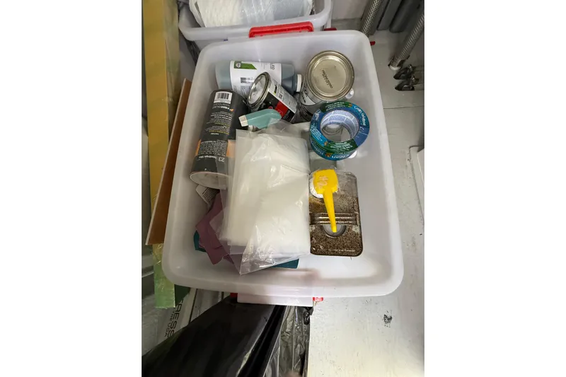 Dauntless Yacht Photos Pics Storage bin with assorted supplies on a 2024 Seawind 1370 yacht.