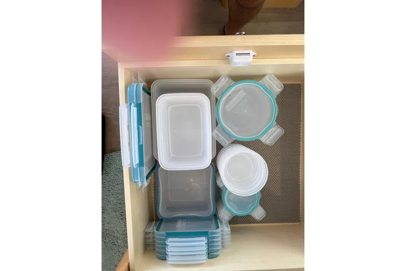 Dauntless Yacht Photos Pics Organized drawer with plastic food containers, Seawind 1370, 2024 model.