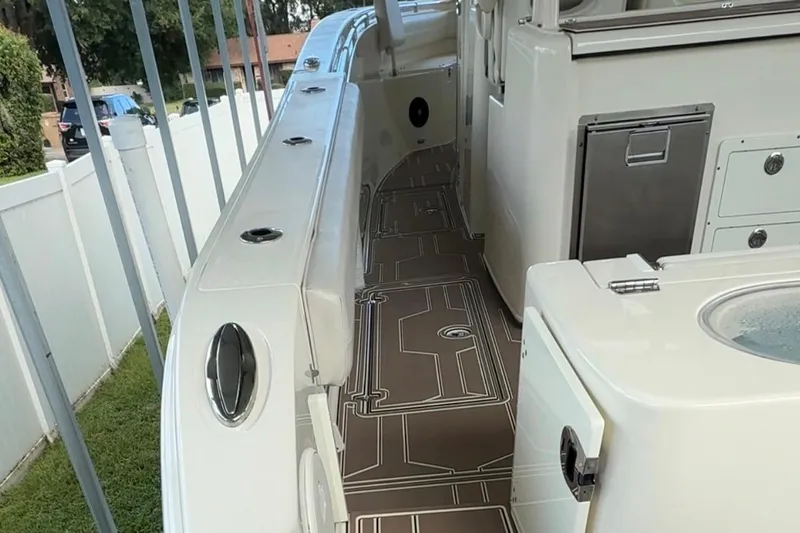  Yacht Photos Pics 2018 Cobia 344 Center Console boat interior with sleek design and modern amenities.