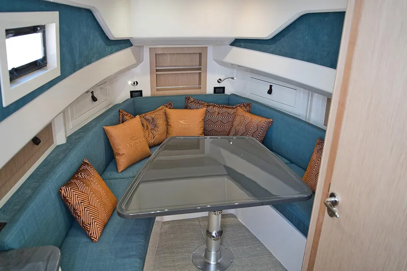  Yacht Photos Pics Luxurious interior of 2025 Cayman Yachts 380 WA with elegant seating and modern design.