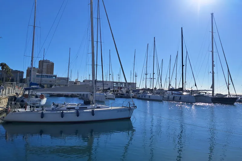  Yacht Photos Pics Sailboats docked in a sunny marina, featuring a 1999 J Boats J/120.