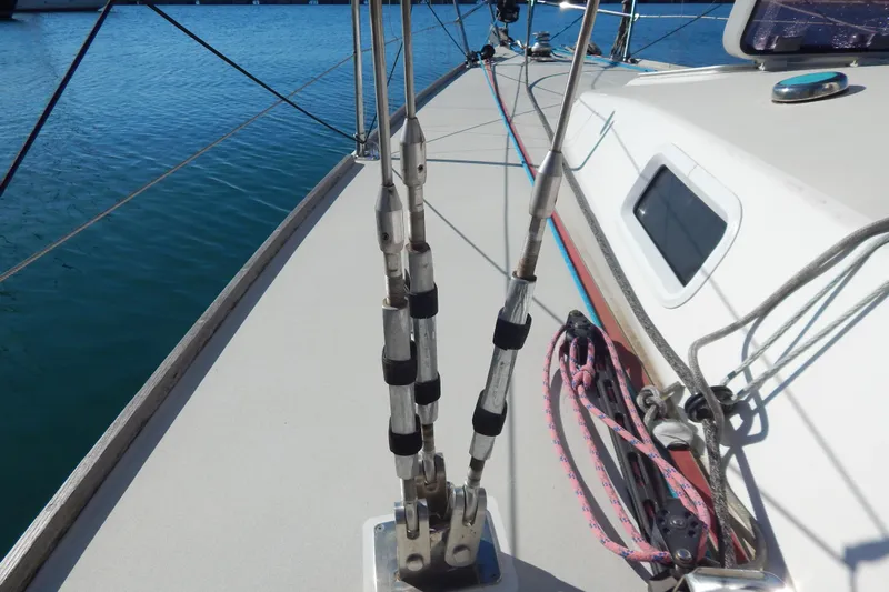  Yacht Photos Pics Deck view of a 1999 J Boats J/120 sailboat with rigging and ropes.