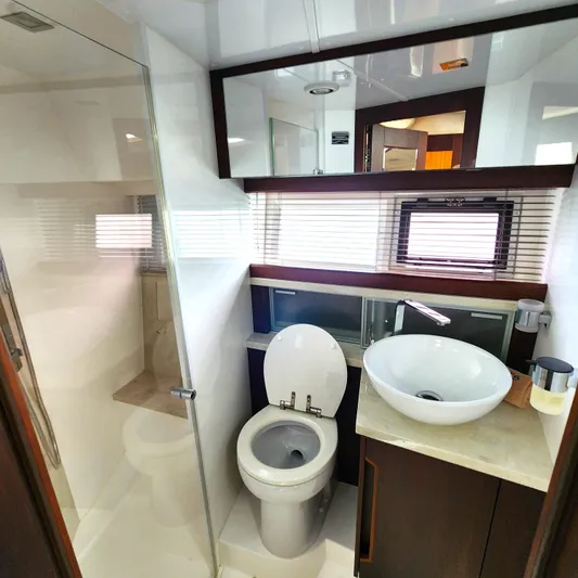 Makers Time Yacht Photos Pics Luxurious bathroom in 2018 Galeon 430 HTC yacht with modern fixtures and elegant design.