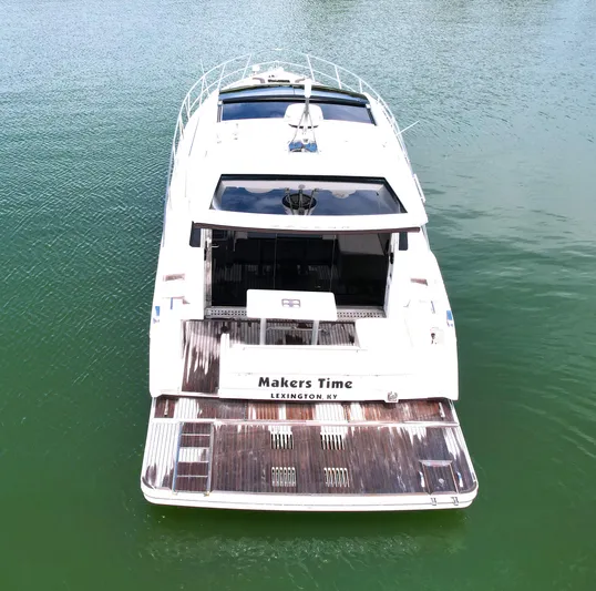 Makers Time Yacht Photos Pics 2018 Galeon 430 HTC yacht on water, rear view, named "Makers Time."