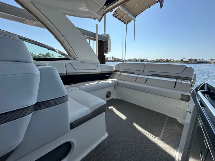  Yacht Photos Pics 2020 Formula 350 Crossover Bowrider OB interior with spacious seating and scenic water view.