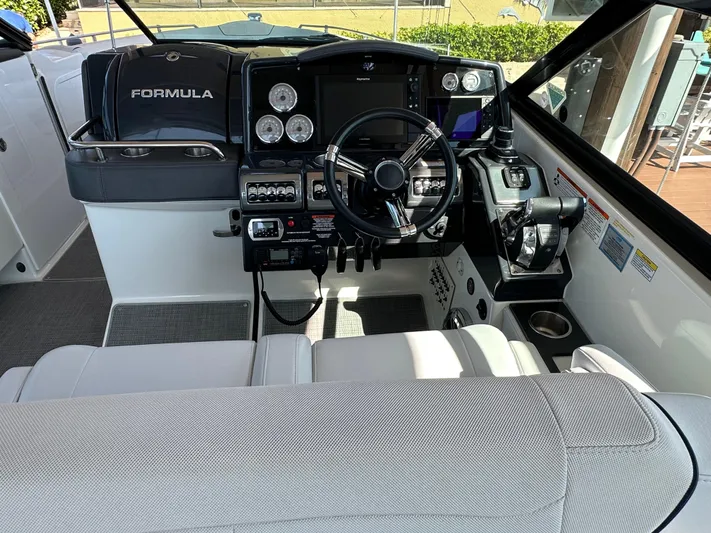  Yacht Photos Pics 2020 Formula 350 Crossover Bowrider OB cockpit with modern controls and steering wheel.