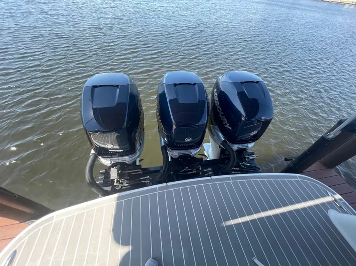  Yacht Photos Pics 2020 Formula 350 Crossover Bowrider OB with triple outboard engines on water.