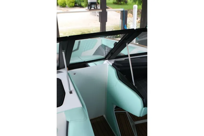  Yacht Photos Pics 2024 Nautique Super Air Nautique G23 interior with mint green and black seating.