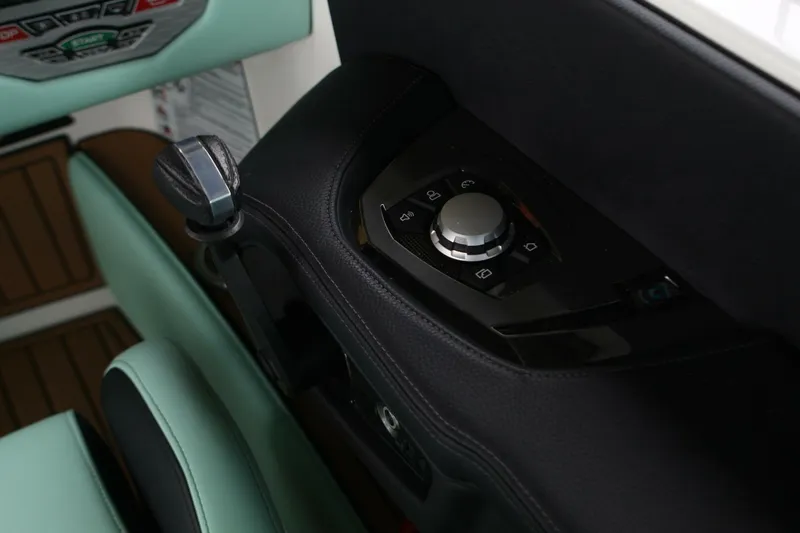  Yacht Photos Pics 2024 Nautique Super Air Nautique G23 control panel with sleek design and modern features.