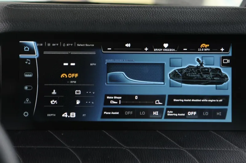  Yacht Photos Pics 2024 Nautique Super Air Nautique G23 dashboard display with control settings and navigation features.