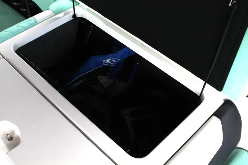  Yacht Photos Pics Open storage compartment in 2024 Nautique Super Air Nautique G23 boat.