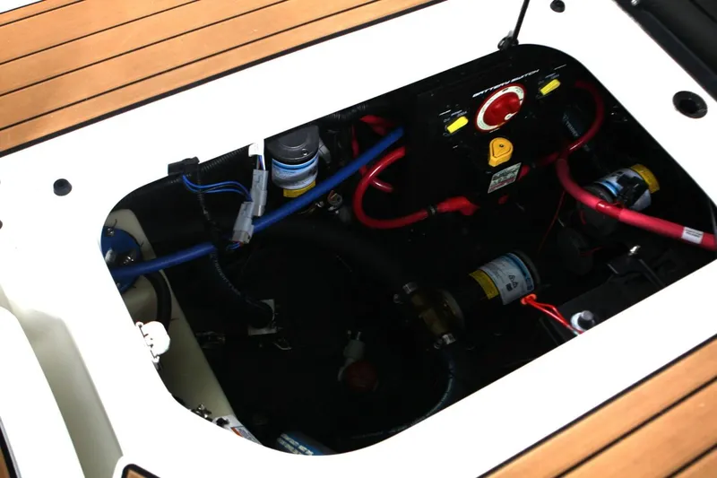 Yacht Photos Pics 2024 Nautique Super Air Nautique G23 engine compartment with wiring and components.