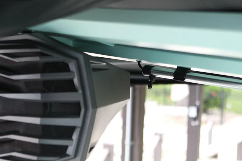  Yacht Photos Pics 2024 Nautique Super Air Nautique G23 speaker detail under boat canopy.