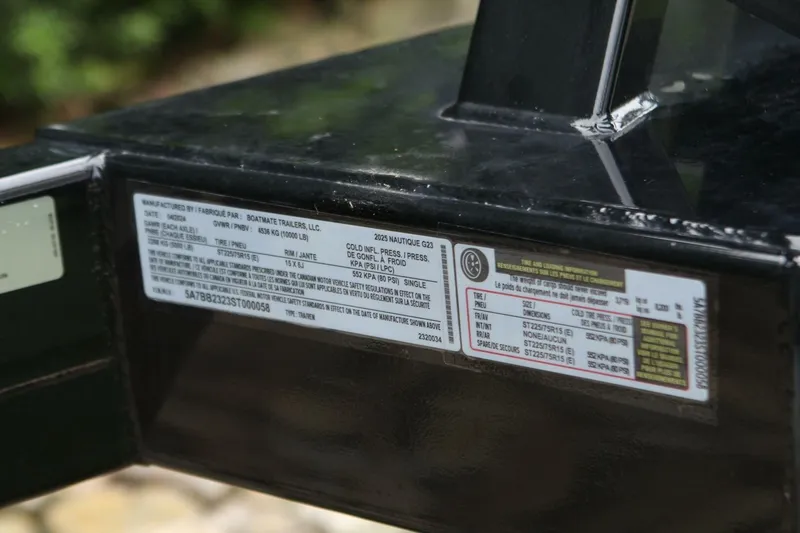  Yacht Photos Pics Label on 2024 Nautique Super Air Nautique G23 trailer, detailing specifications and tire information.