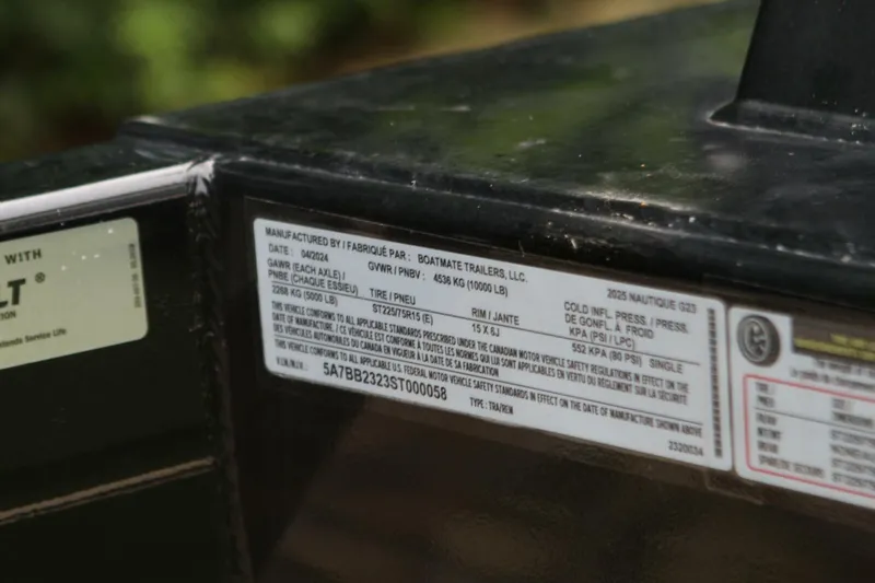  Yacht Photos Pics Label on 2024 Nautique Super Air Nautique G23 trailer, detailing specifications and compliance information.