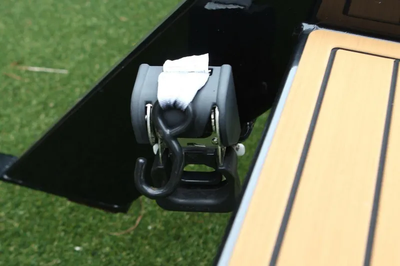  Yacht Photos Pics 2024 Nautique Super Air Nautique G23 boat detail with hook and strap on deck.