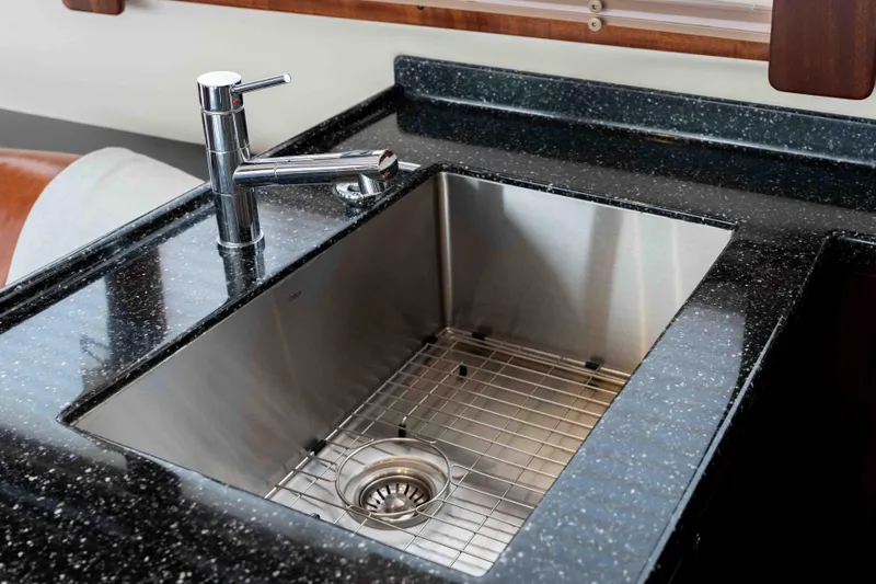 Take 2 Yacht Photos Pics Stainless steel sink with modern faucet on Nordic Tug 44, 2015 model yacht.