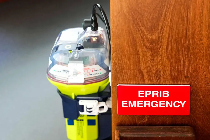 Take 2 Yacht Photos Pics EPIRB emergency device on 2015 Nordic Tug 44 boat, highlighting safety equipment.
