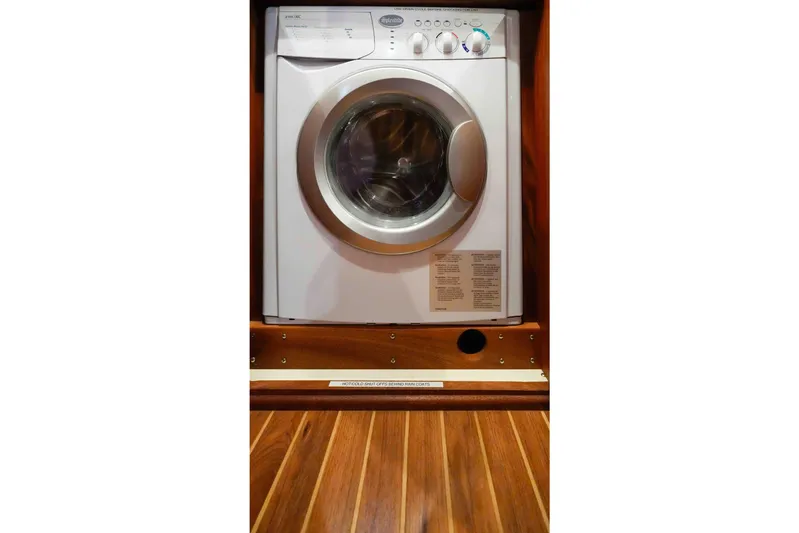 Take 2 Yacht Photos Pics Front-loading washing machine in a 2015 Nordic Tug 44 boat interior.