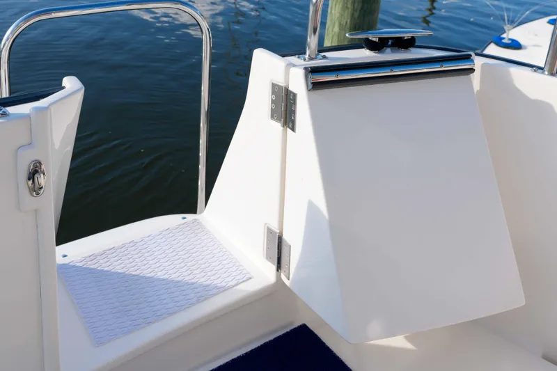 Take 2 Yacht Photos Pics Nordic Tug 44 (2015) boat deck detail with water background.