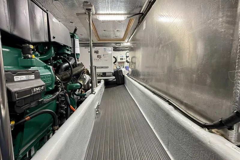 Take 2 Yacht Photos Pics Engine room of a 2015 Nordic Tug 44, featuring a Volvo Penta engine.