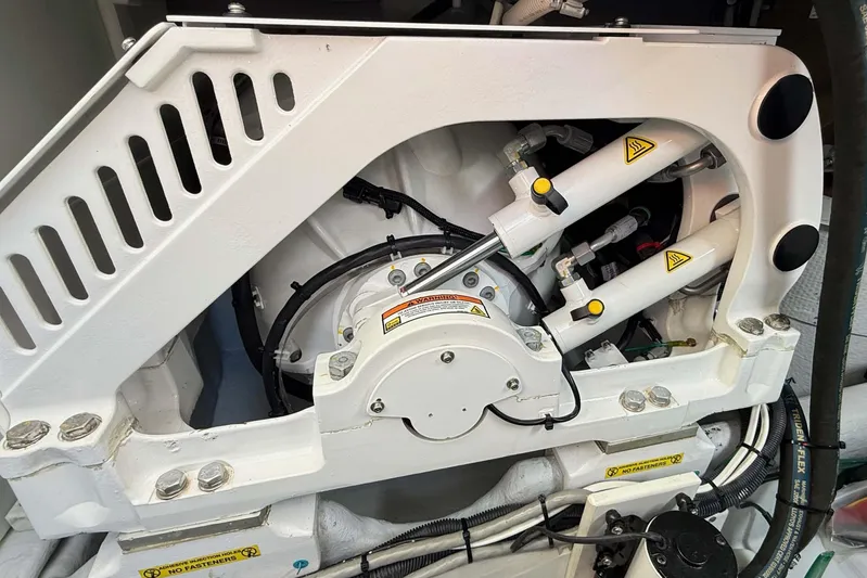 Take 2 Yacht Photos Pics Engine compartment of a 2015 Nordic Tug 44, showcasing mechanical components and hydraulic systems.