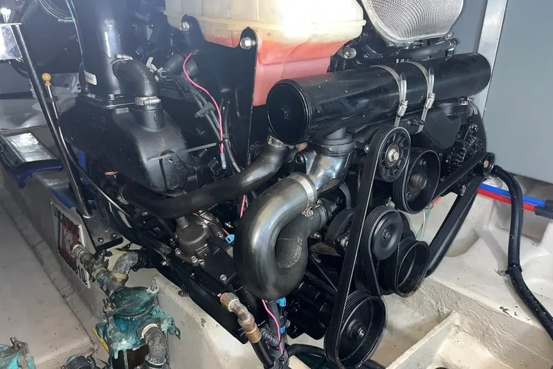 Production Office Yacht Photos Pics Engine compartment of a 2007 Sea Ray 36 Sedan Bridge boat, showcasing mechanical components.