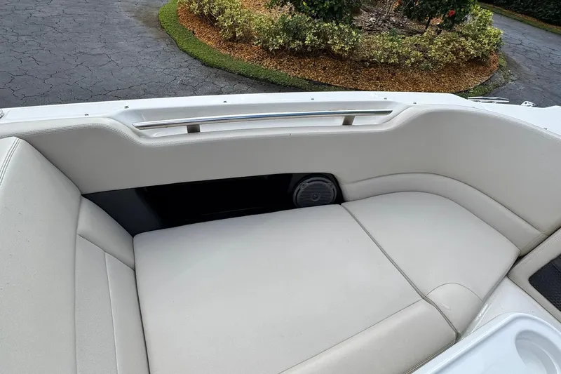  Yacht Photos Pics 2019 Boston Whaler 230 Vantage boat interior with white cushioned seating.