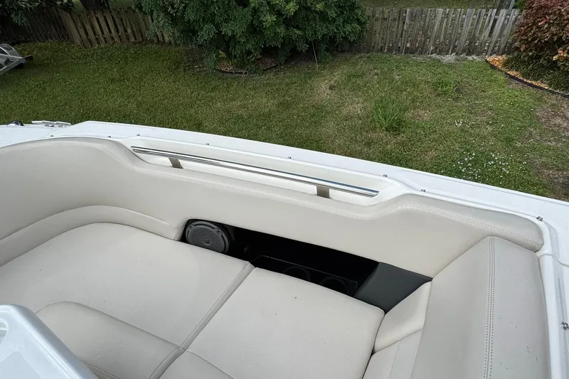  Yacht Photos Pics 2019 Boston Whaler 230 Vantage boat interior with white cushioned seating.